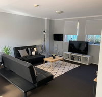 Cozy 3BR Townhouse in Liverpool CBD with parking - Accommodation in Bendigo
