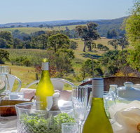 The Farmhouse - grape vines and rolling green hills - Accommodation in Bendigo